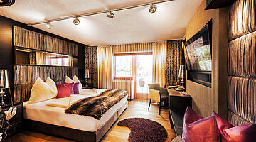 Glamour-style double room with a spa bath at the Hotel Winzer