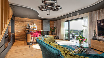 Stylish living area of the Private Spa Villa at the Hotel Winzer in Austria