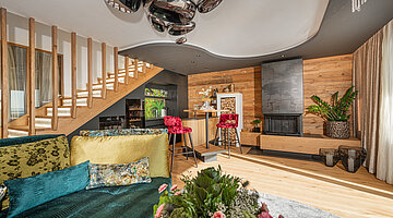 Kitchen area with a small bar in the Private Spa Villa at the Hotel Winzer