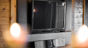 Large flat-screen TV in the Harmonie Suite at the Hotel Winzer