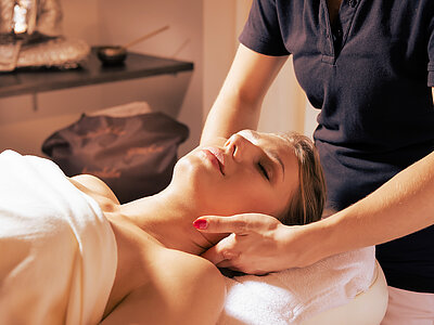 A soothing back massage in the wellness area at Hotel Winzer