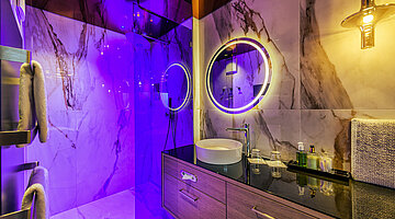 The elegant bathroom in the Spa Double Room at the Hotel Winzer
