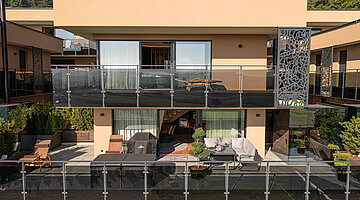 Exterior view of the Private Spa Villa Austria at the Hotel Winzer in the sunshine
