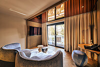Comfortable seating in the Spa Deluxe double room at Hotel Winzer
