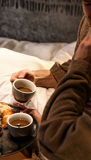 Breakfast in bed in a room at the romantic Hotel Winzer