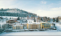 Exterior view of the Hotel Winzer on a snowy winter's day