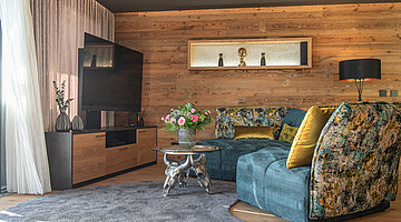 Stylish living area of the Private Spa Villa at the Hotel Winzer in Austria